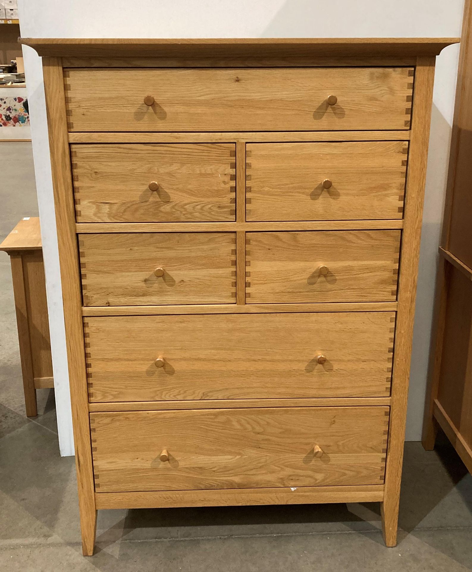 Willis & Gambier oak chest of drawers, four short and three long,