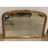Gilt framed domed top mirror in a vintage style,