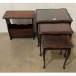 Mahogany nest of three tables with glass inserts and a mahogany magazine rack (saleroom location: