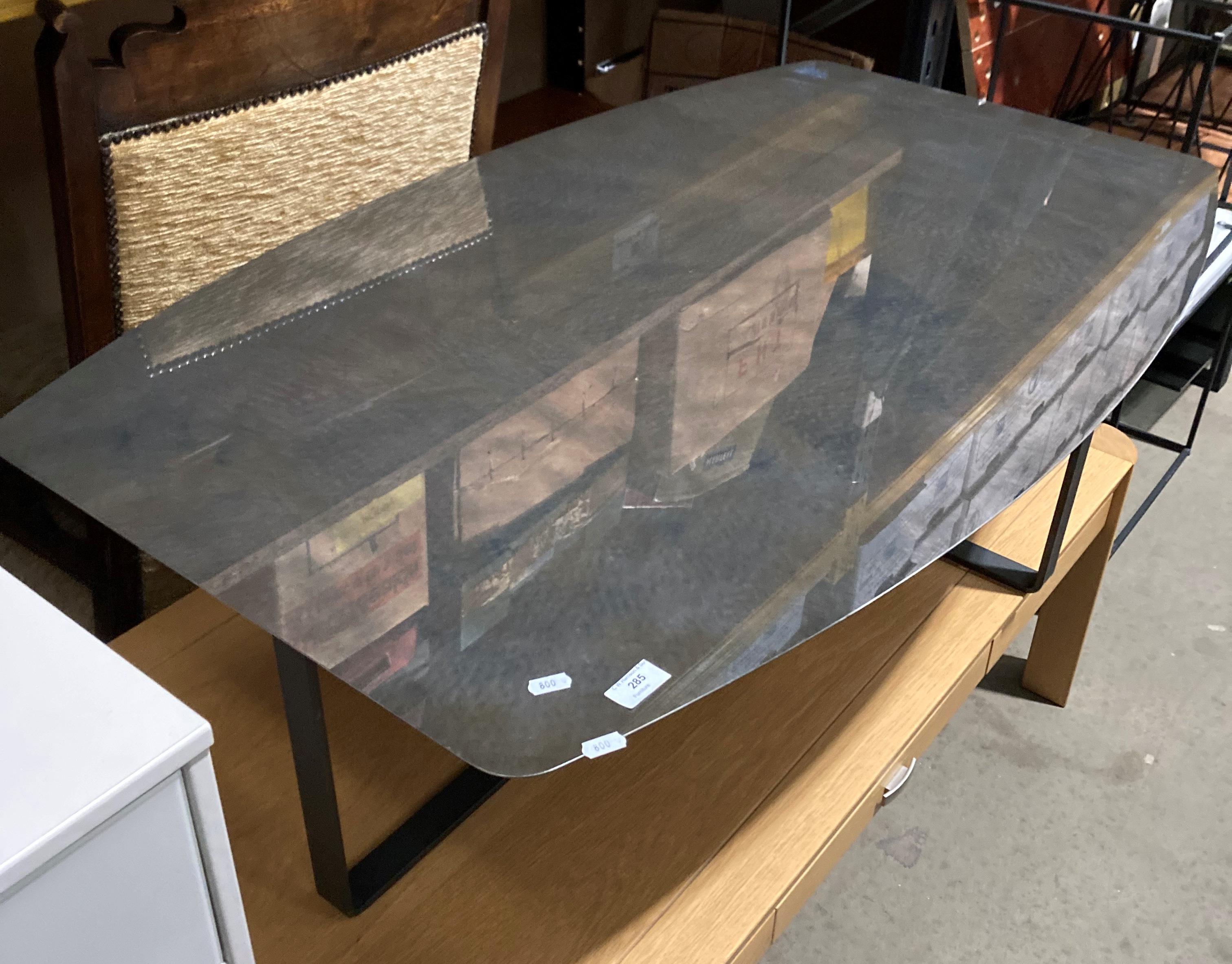 A granite-effect metal-topped coffee table,