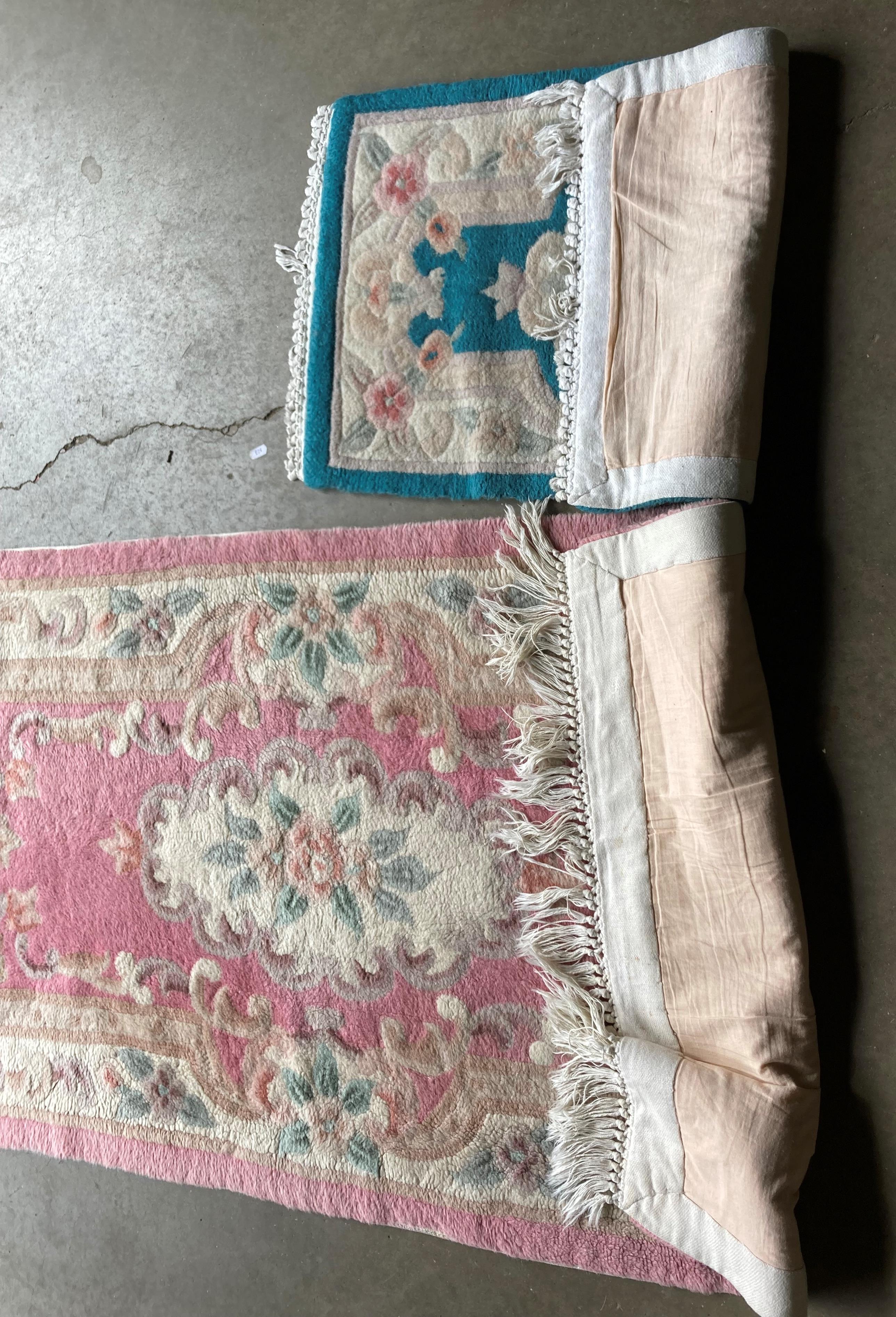 Two Chinese-style rugs - pink pattern (150 x 75cm) and blue pattern (75 x 45cm) (saleroom location: - Image 4 of 4