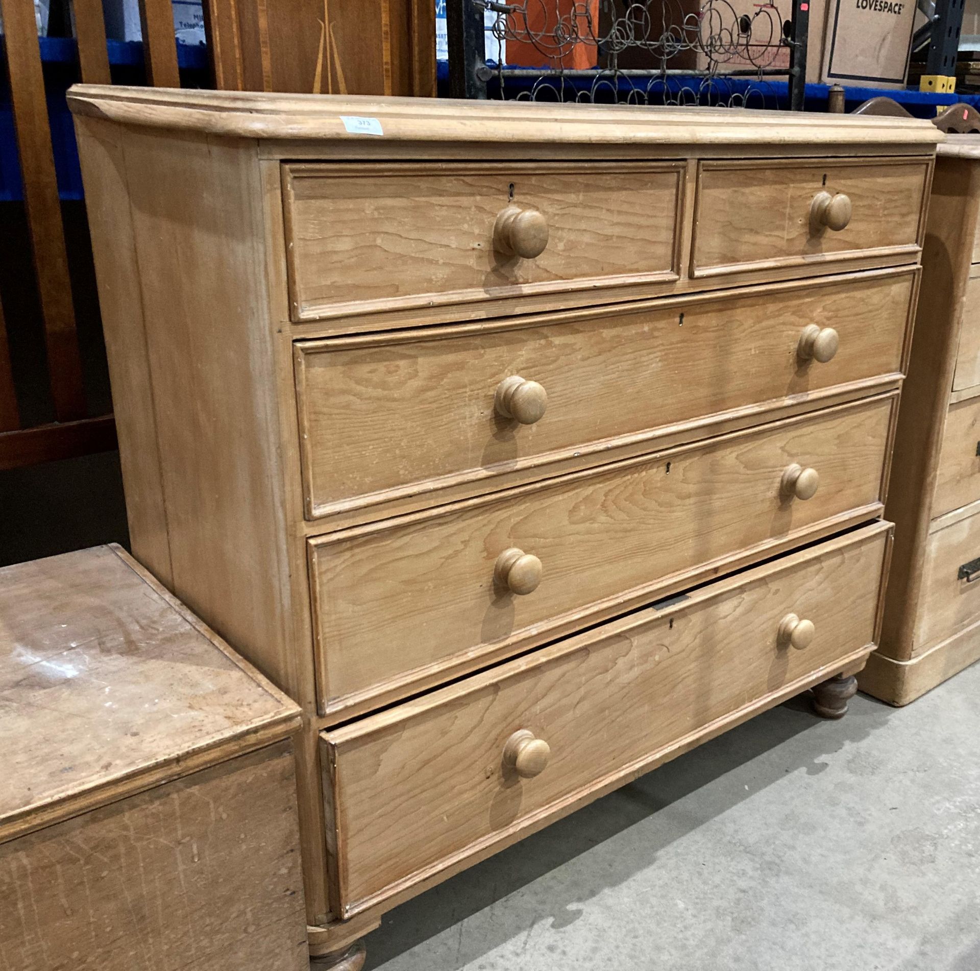 A pine five-drawer (two short, three long) chest of drawers,