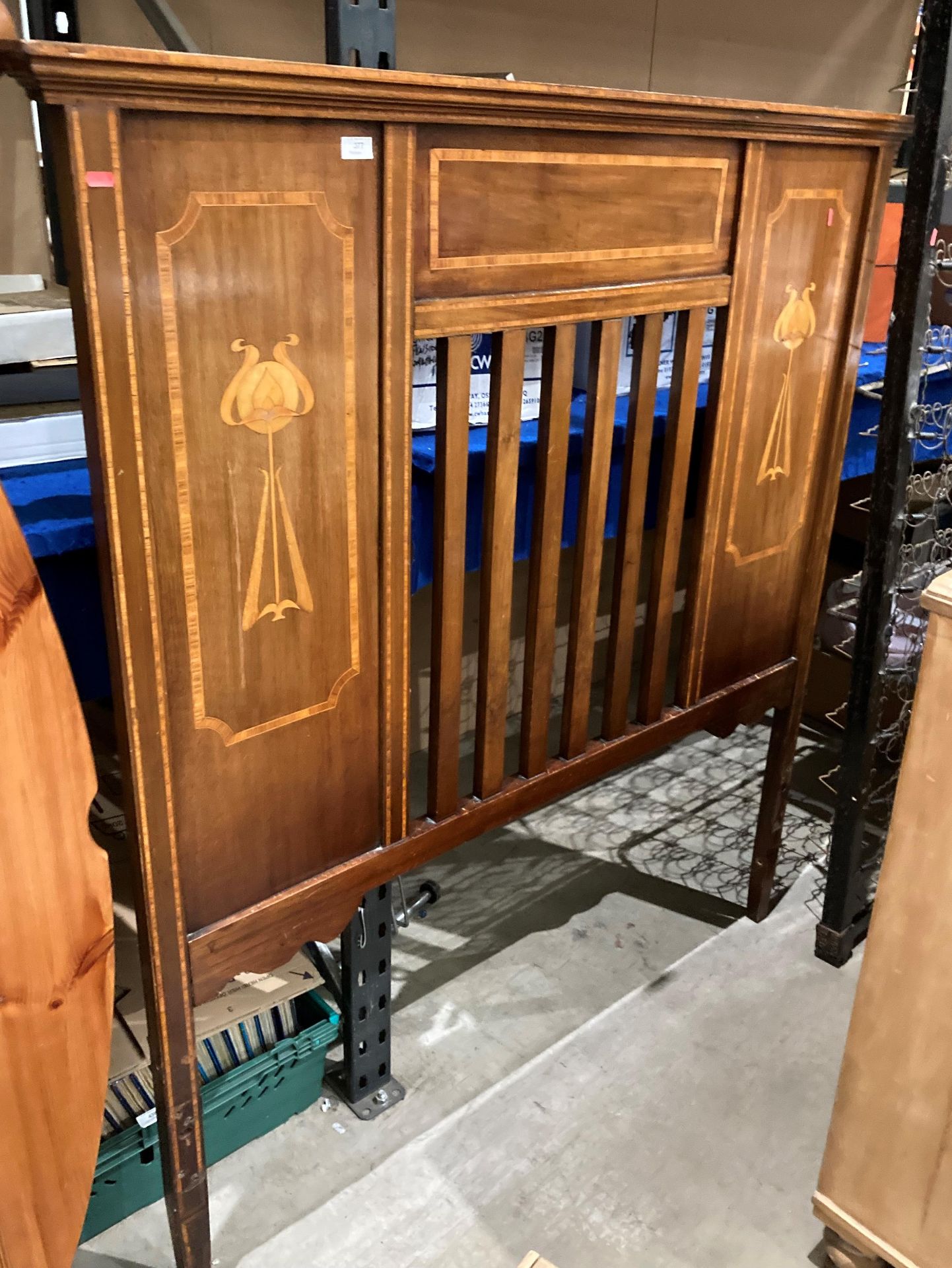 A mahogany Art Nouveau 4'6 bed headboard (saleroom location: S3 QC02)