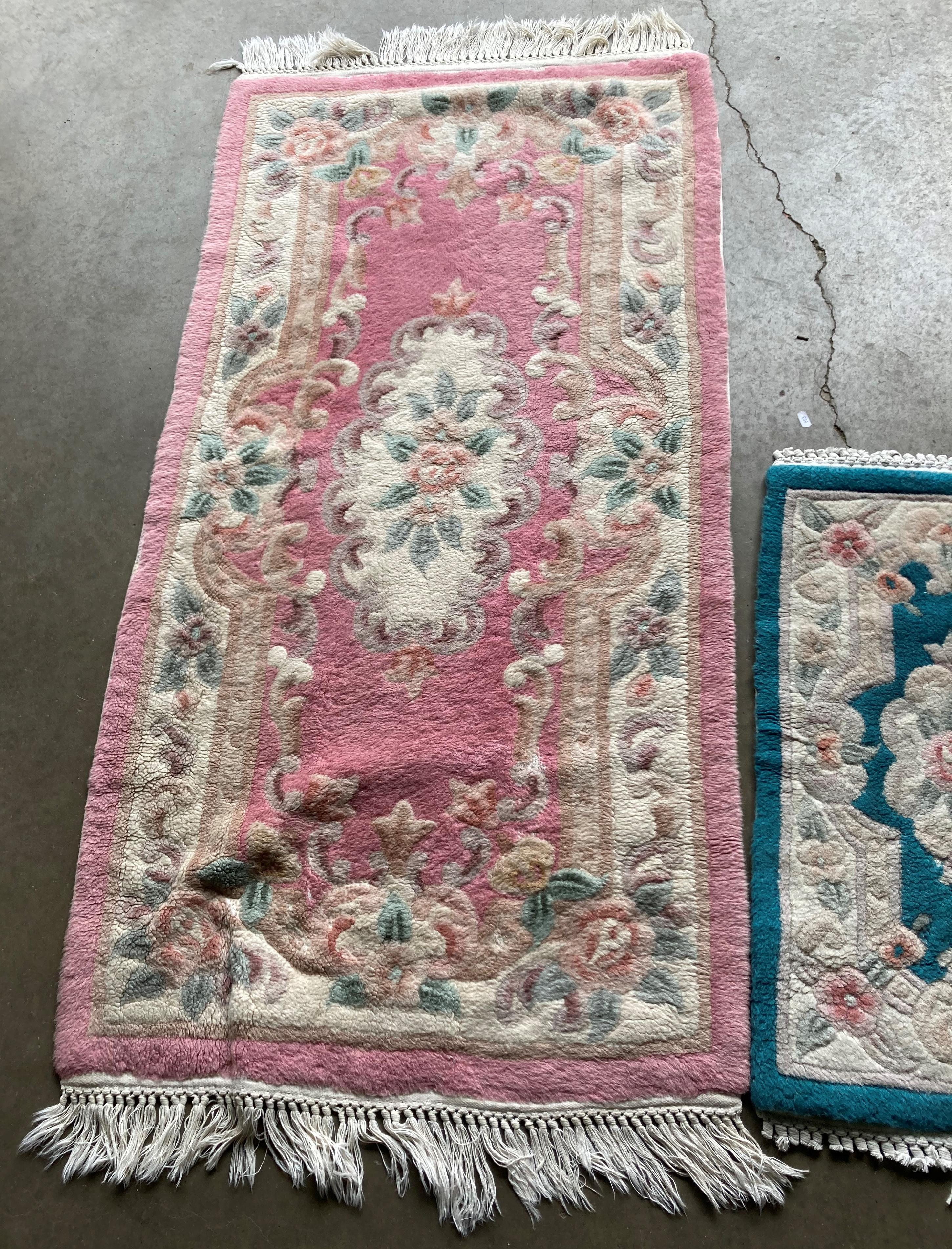 Two Chinese-style rugs - pink pattern (150 x 75cm) and blue pattern (75 x 45cm) (saleroom location: - Image 2 of 4