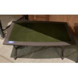 Dark speckled glass-topped coffee table on a grey metal frame - size 102 x 61cm (saleroom location: