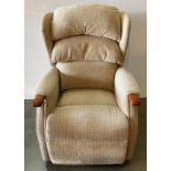 Manual reclining high-back armchair in an oatmeal coloured fabric (saleroom location: MA4)