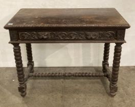 A late 19th Century Gothic-revival oak side table with single-drawer, carved edges,