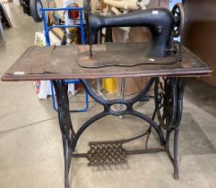 Metal sewing machine on Singer cast metal frame (saleroom location: S3 QC18)