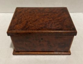 A jewellery box with thuya wood finish, lift-top,