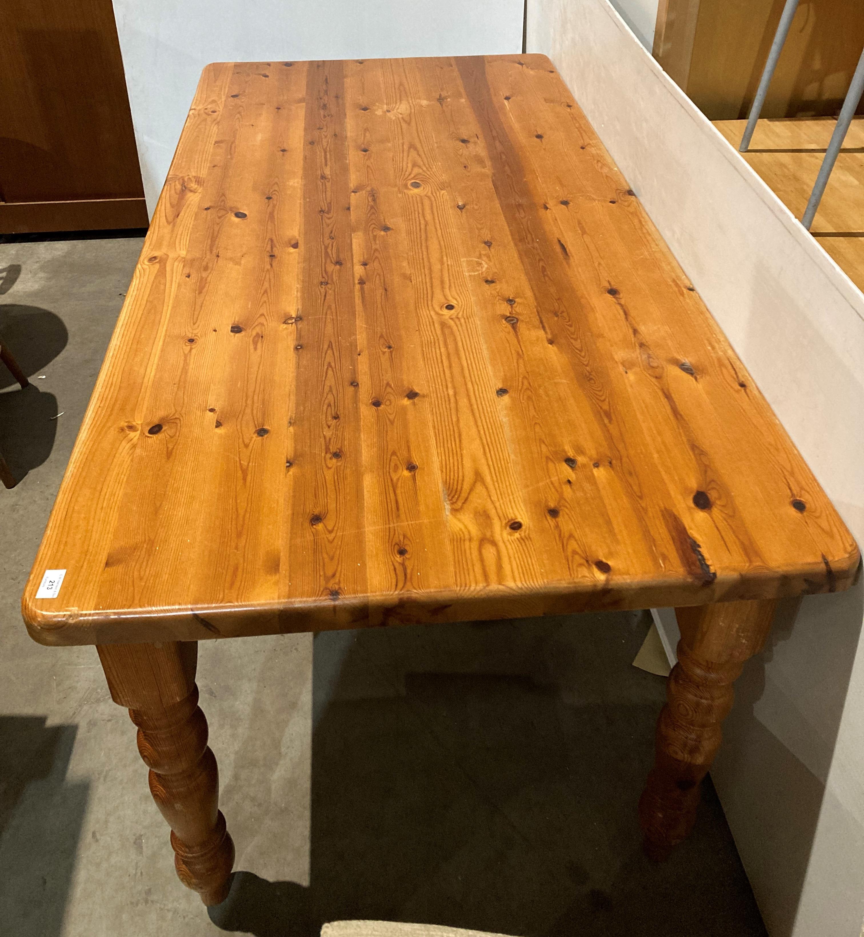 Solid pine farmhouse table on turned legs,