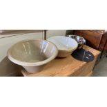 A beige stoneware pancheon mixing bowl,
