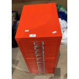 An orange ten-drawer index cabinet (saleroom location: S3 QC03)