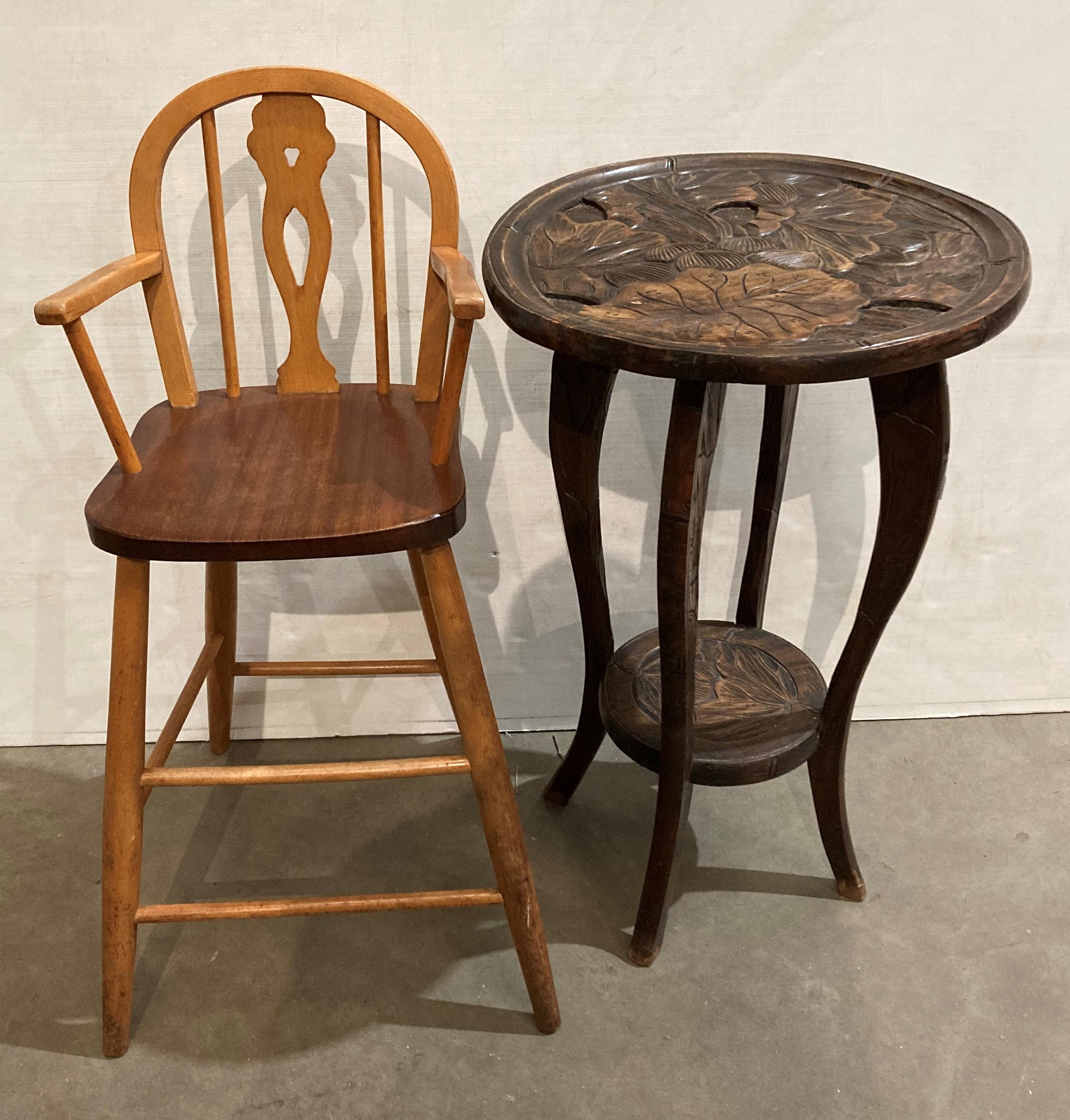 Oriental-style dark wood side table with hand-carved floral design (45cm diameter x 72cm high) and