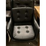 A black vinyl high-back swivel armchair on four star base [please note: this item is to be sold as