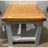 An oak square side/coffee table with a lower grey finish,