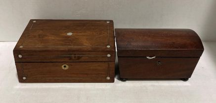 A mahogany tea-caddy in a sarcophagus shape (21cm long) and a mahogany lift-top box with mother of