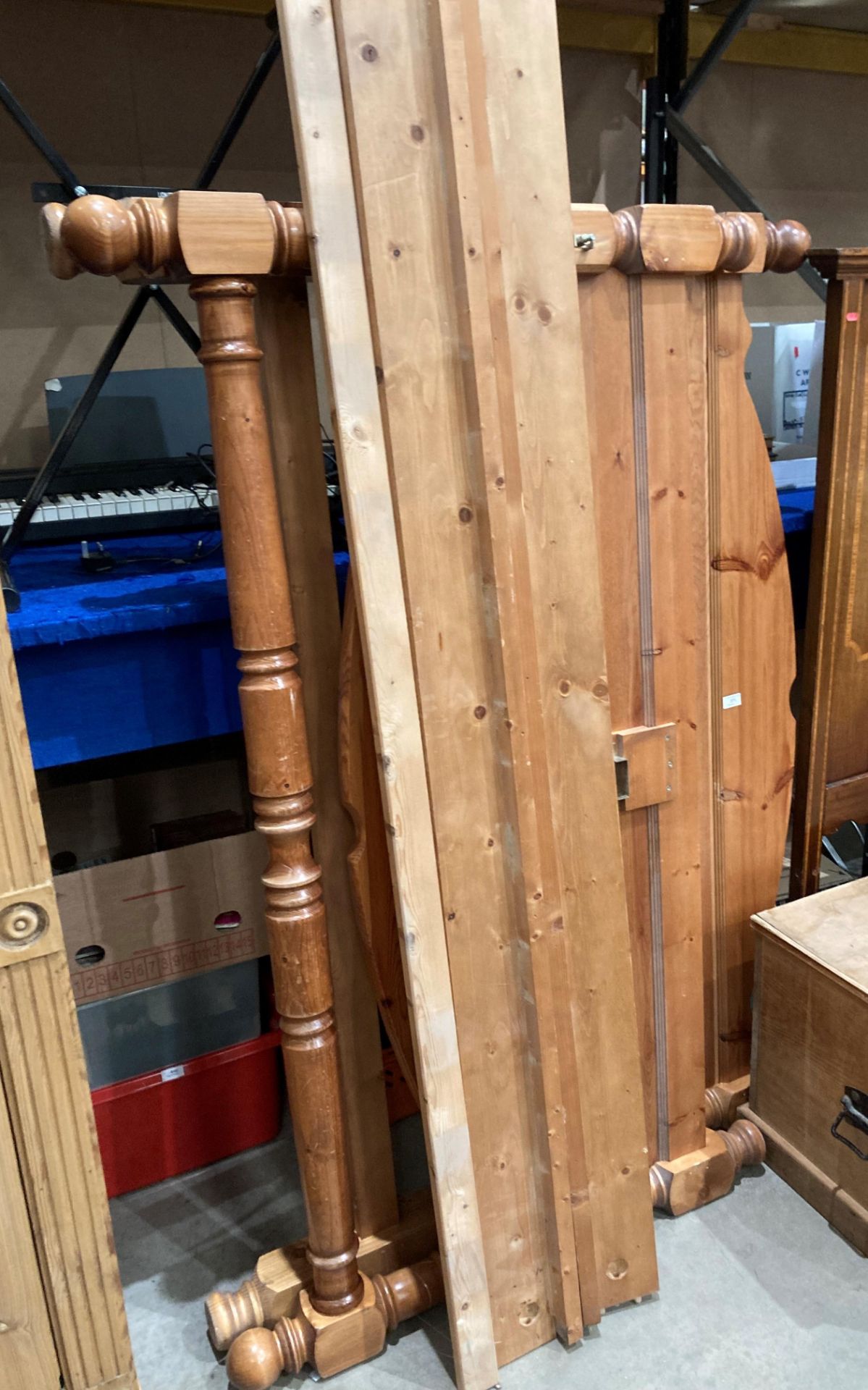 A pine 5' bed frame (saleroom location: S3 QC01)