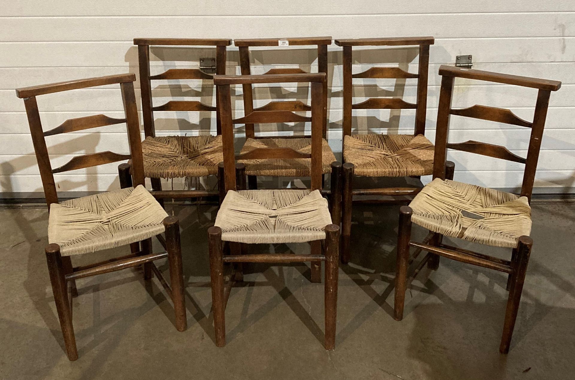 Set of six elm church chairs with re-woven seats and two with book shelves (saleroom location: MA4)