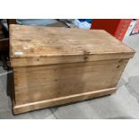 A pine blanket box (the loose castor is in the blanket box),