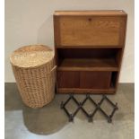 Three items - a wicker laundry basket,