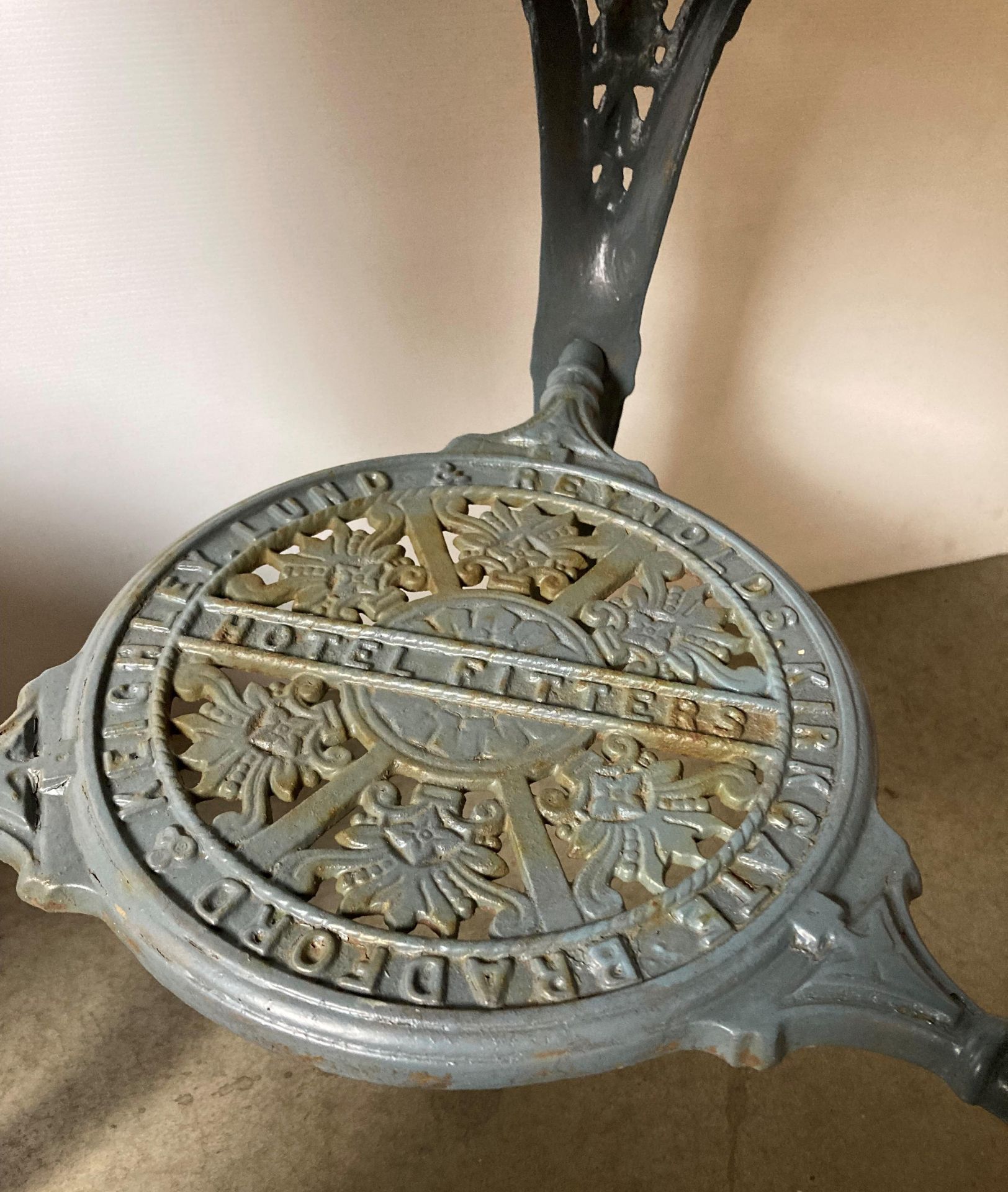 A vintage cast iron pub table with copper covered top and under-shelf with inscription reading - Image 2 of 5