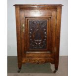 Mid-Century oak single-door cupboard with carved panel,