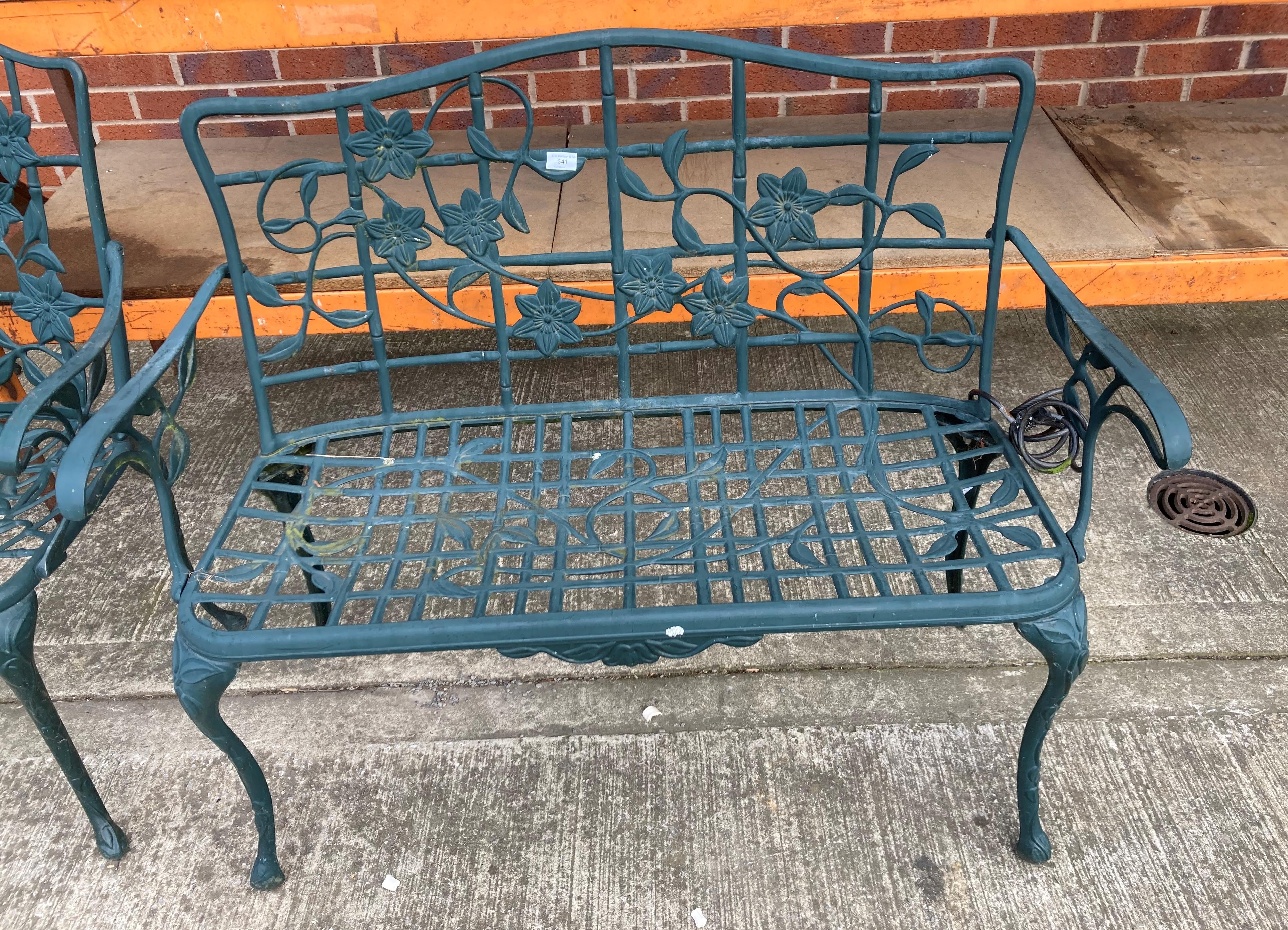 A green painted aluminium garden bench,