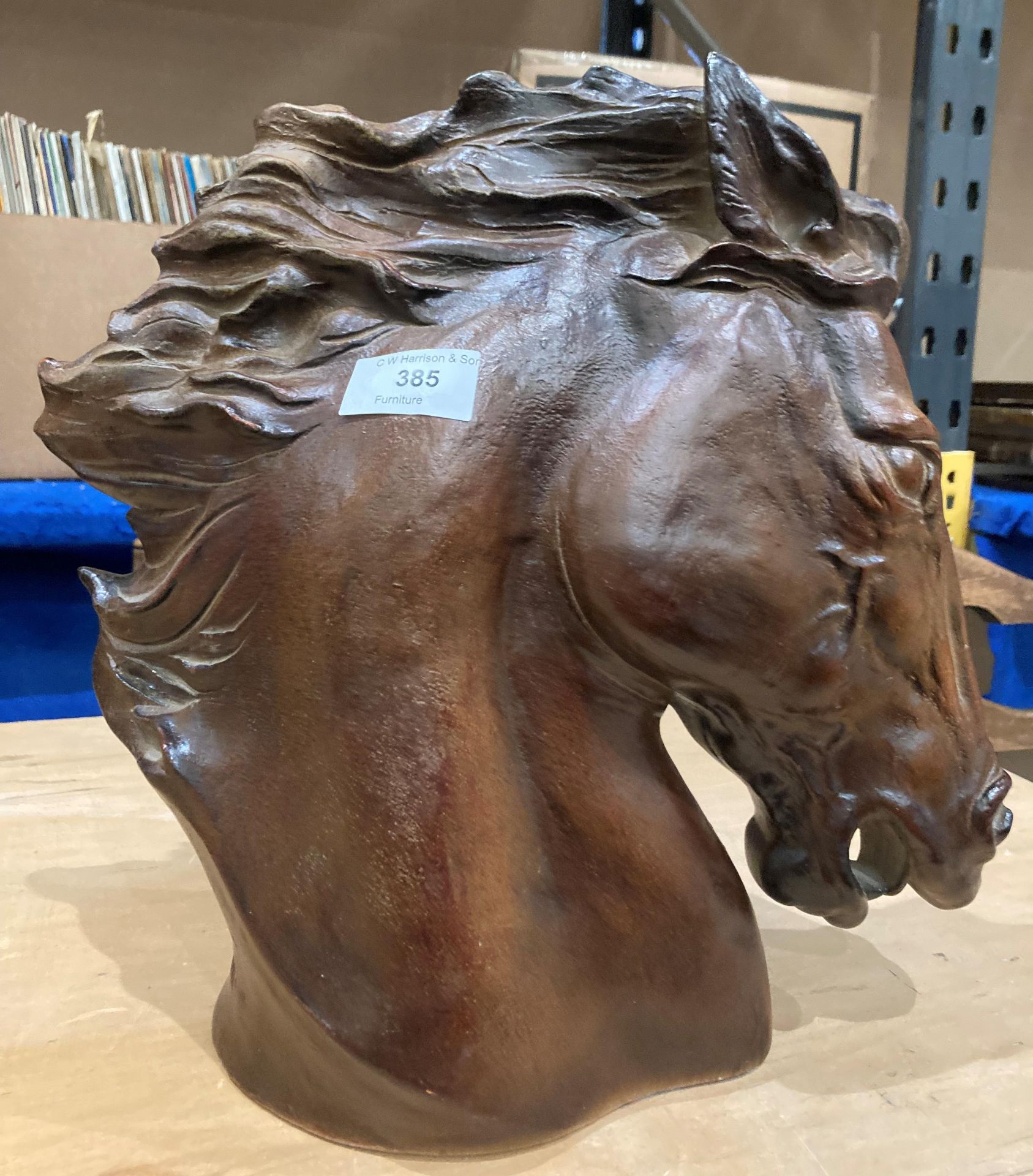 An Austin sculpture by J Spratt? of a horse's head,