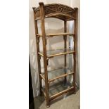 Cane four-shelf open-sided display unit with twisted cane work to top,