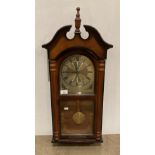 A mahogany finished cased Westminster Chime Quartz wall clock by London Clock Co presented to Mick