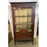 A mahogany four shelf glass display cabinet on tapered legs,