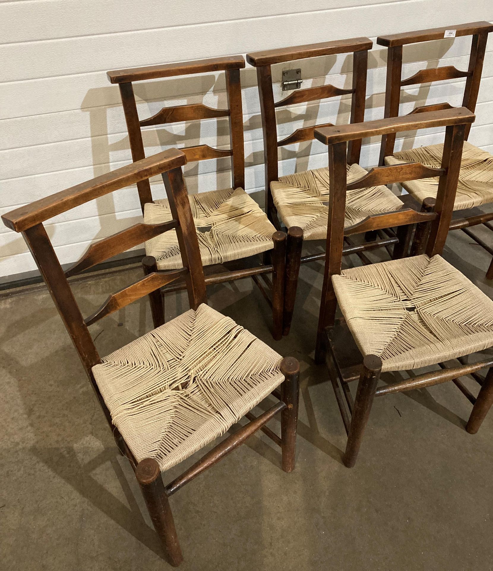 Set of six elm church chairs with re-woven seat and three chairs with book/bible shelves (saleroom - Image 2 of 3