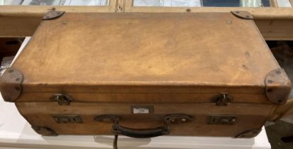 An Everwear light brown hide suitcase,