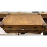 An Everwear light brown hide suitcase,