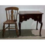 Mid-Century mahogany three-drawer lowboy on cabriole legs and an elm chair with turned legs and