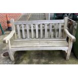 A wood garden bench,