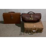A brown leather GPO Gladstone bag,