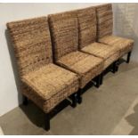 A set of four wicker woven high-back dining chairs on dark stained wooden legs (saleroom location: