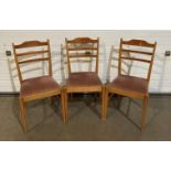 Three beech chairs by Russell of Broadway with light brown fabric (saleroom location: MA3)