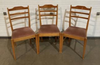 Three beech chairs by Russell of Broadway with light brown fabric (saleroom location: MA3)