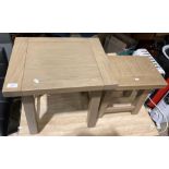 Two light brown stained wood coffee tables,