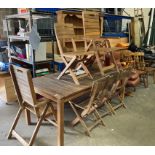 A light wood slatted garden table (180cm x 90cm) complete with two matching folding armchairs and