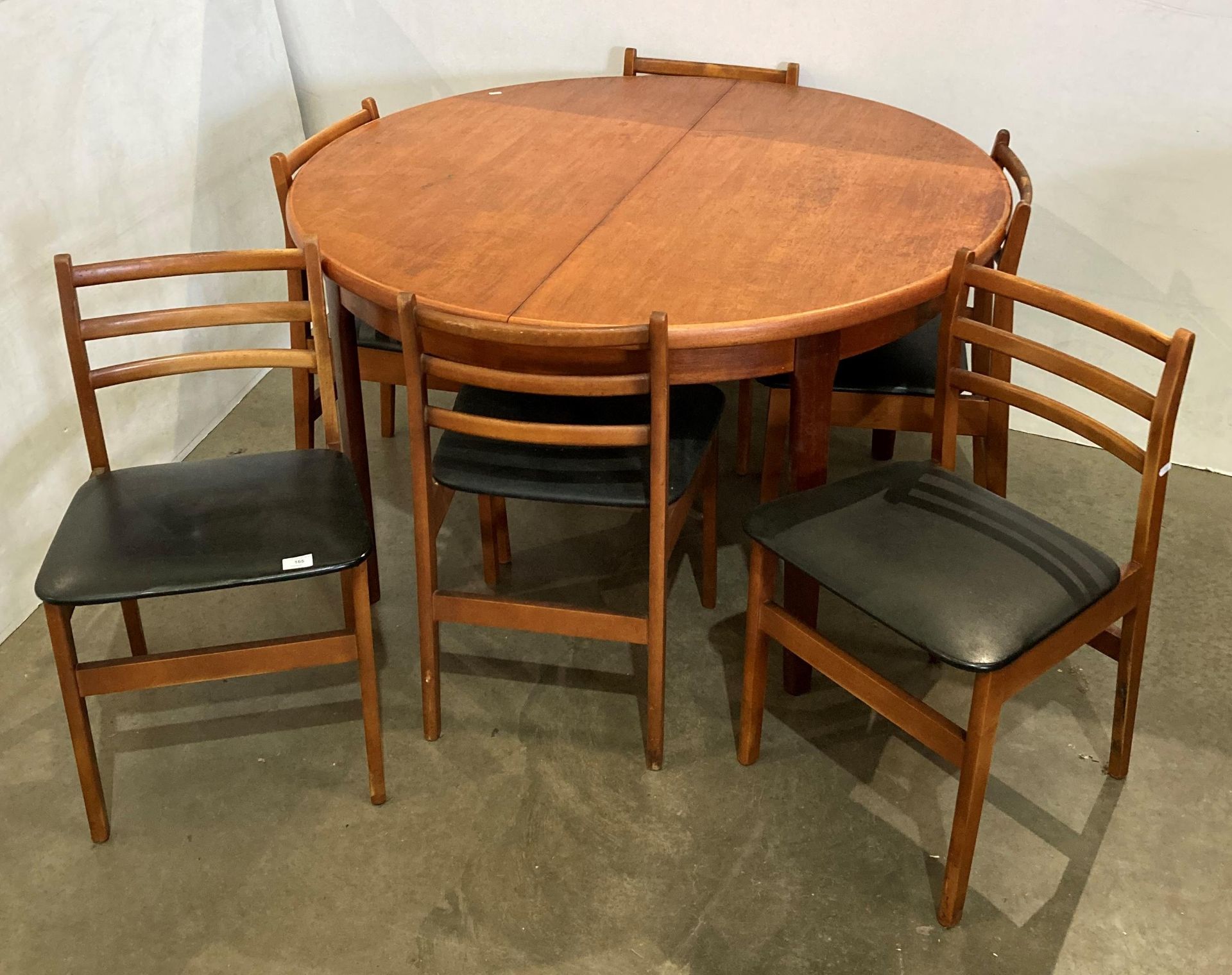 Mid-Century circular extending dining table - possibly Danish (no makers mark visible) - and a set