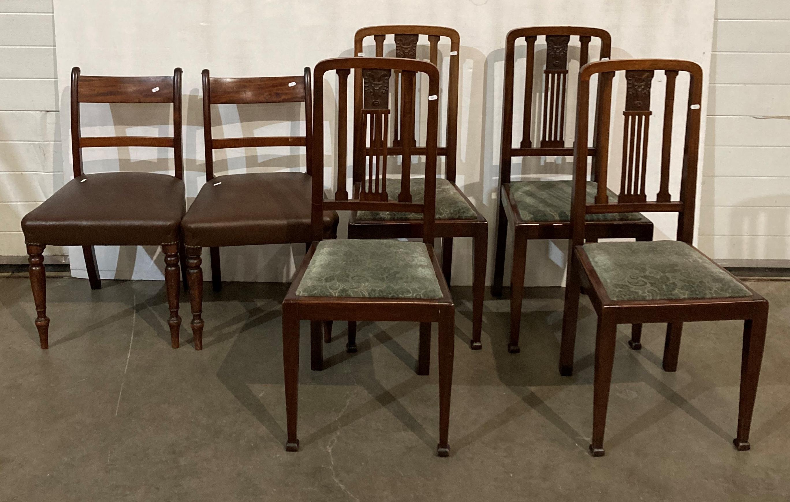 Set of four mahogany rail-back dining chairs with carved central details and a pair of mahogany