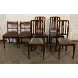 Set of four mahogany rail-back dining chairs with carved central details and a pair of mahogany