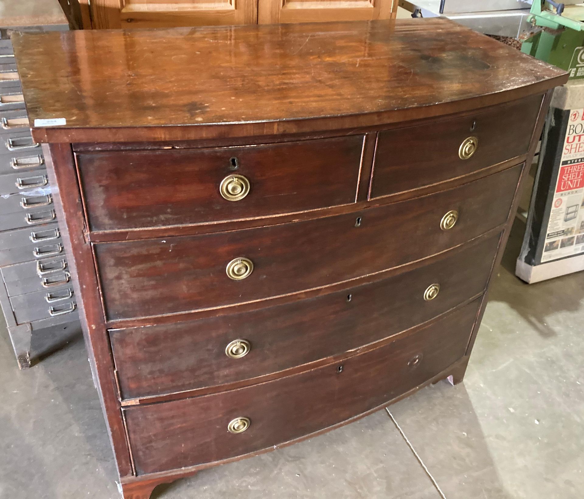 Georgian mahogany bow-front five drawer chest of drawers (two short and three long) with brass