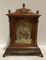 Winterhalder & Hoffmeier 8-day quarter-striking German mantel clock in oak case (Circa 1900) with