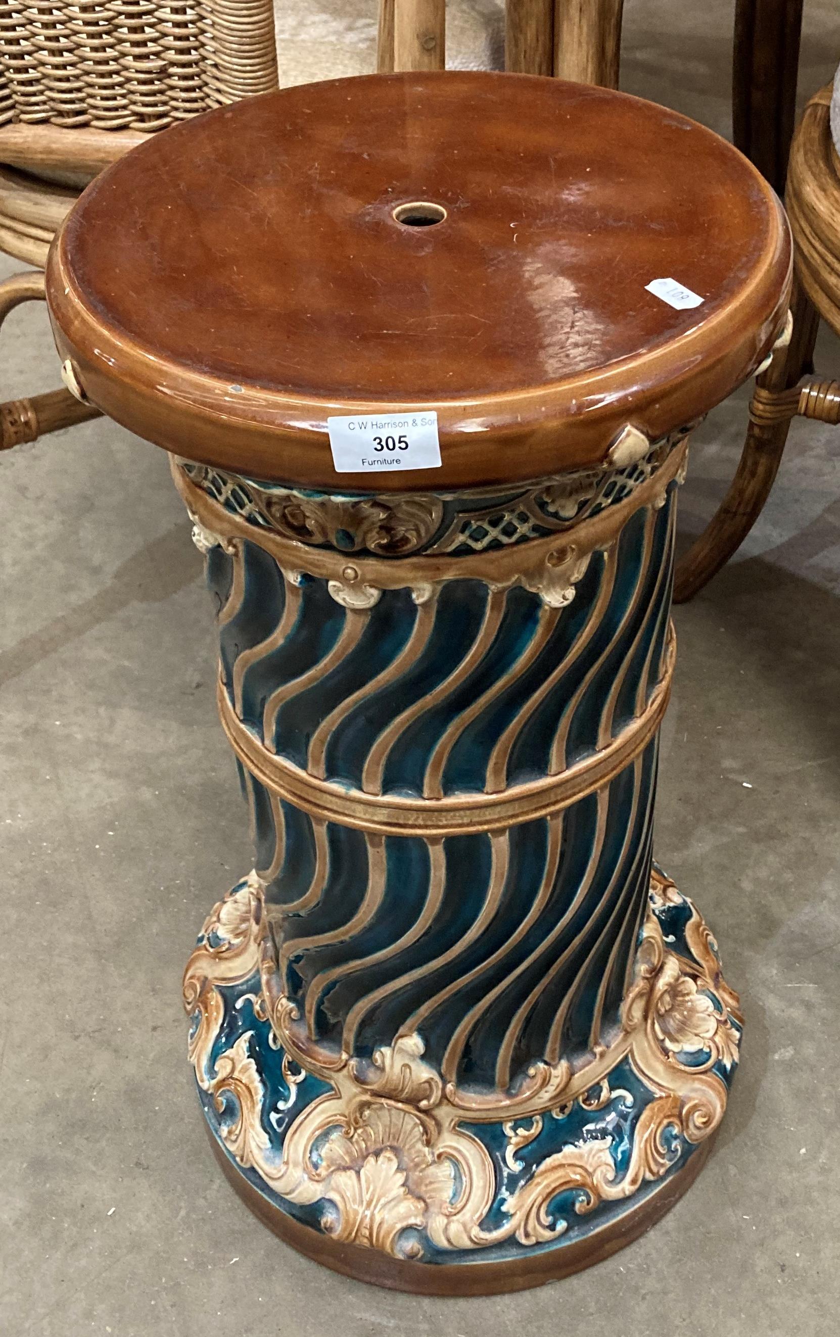 A brown and blue patterned Majolica pottery stand,