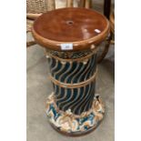 A brown and blue patterned Majolica pottery stand,