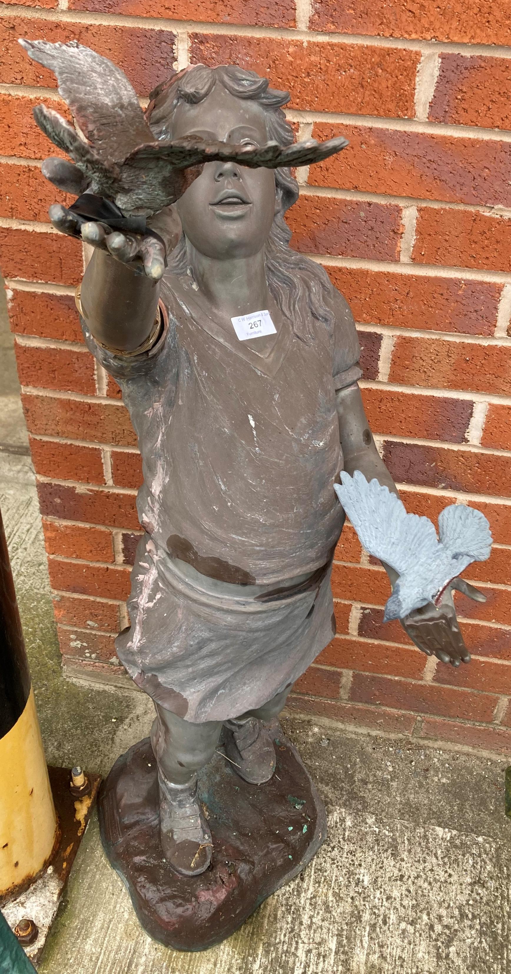 A brown coloured composite statue of a young girl holding birds (120cm high) - sold as seen with